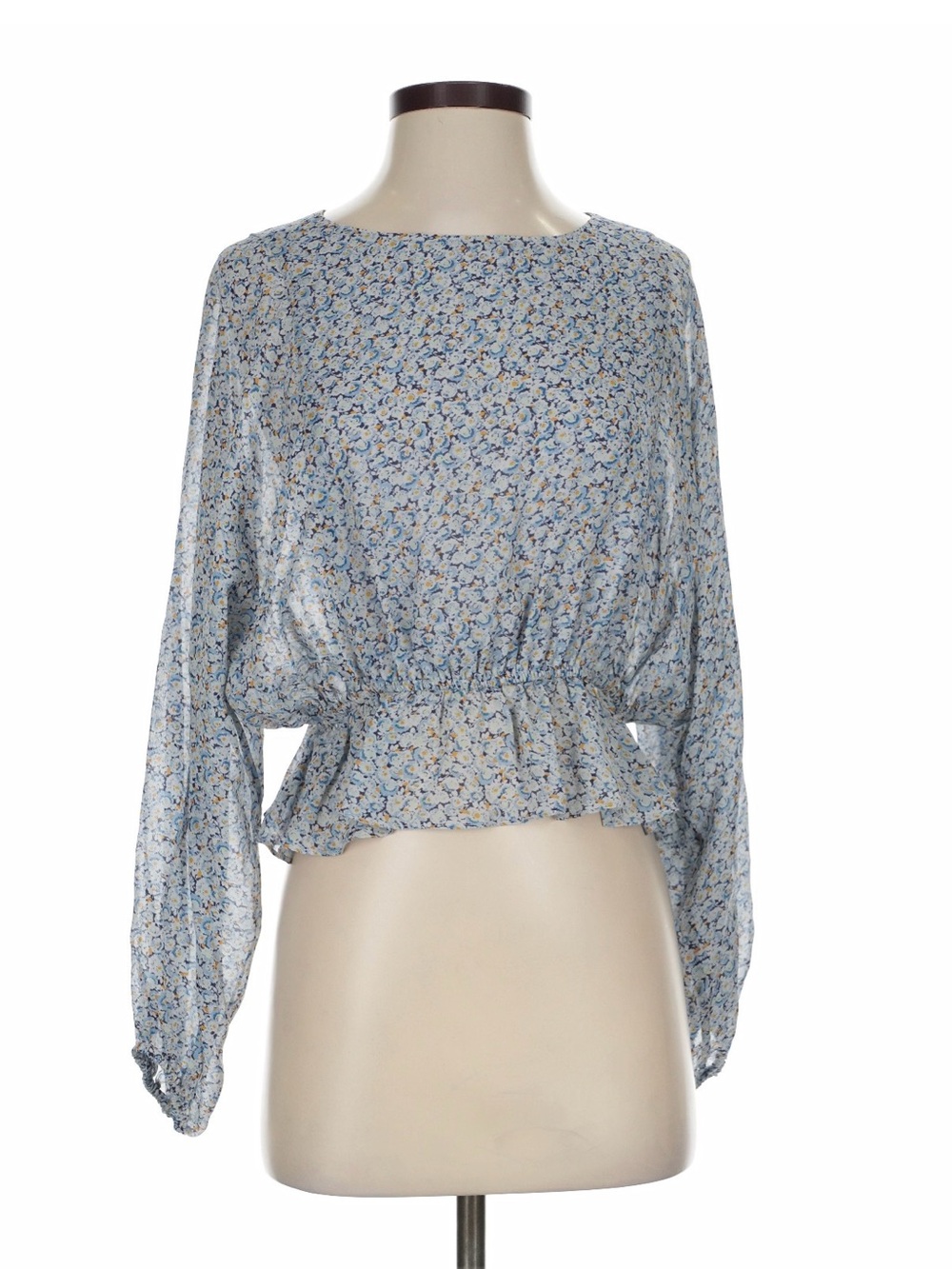 Demure Sweet LoveShackFancy
SILK Nellie Romantic Blouse in delicate floral blue.